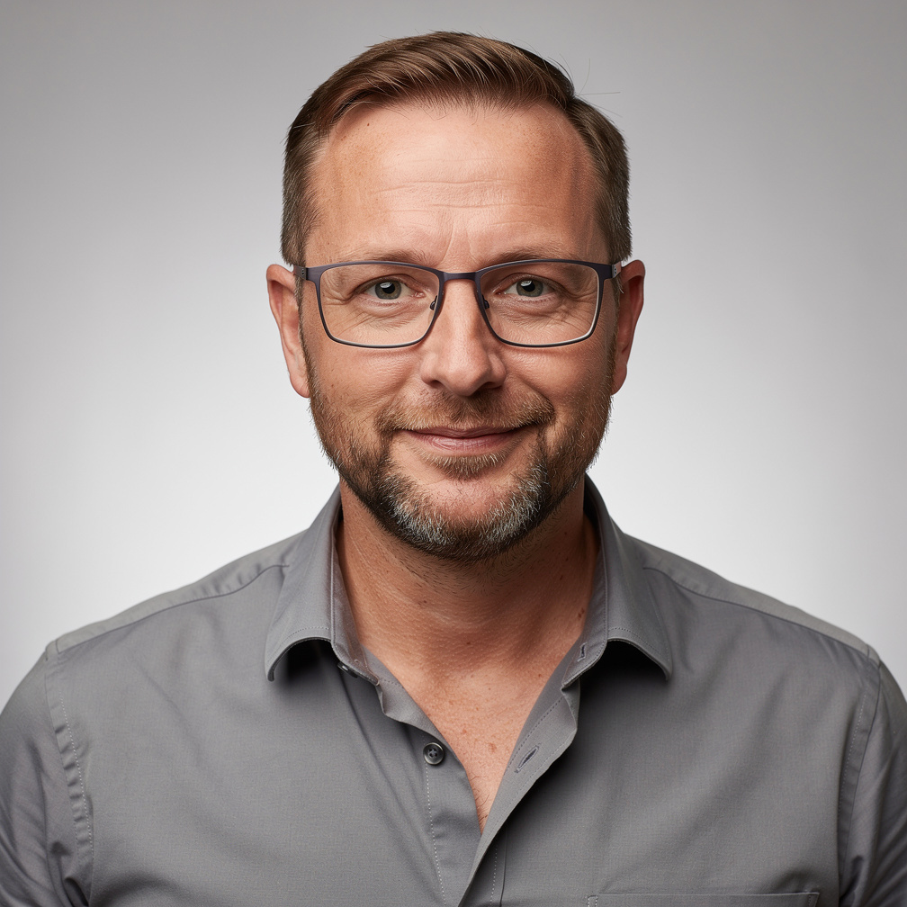 Portrait of a male camera and studio setup instructor